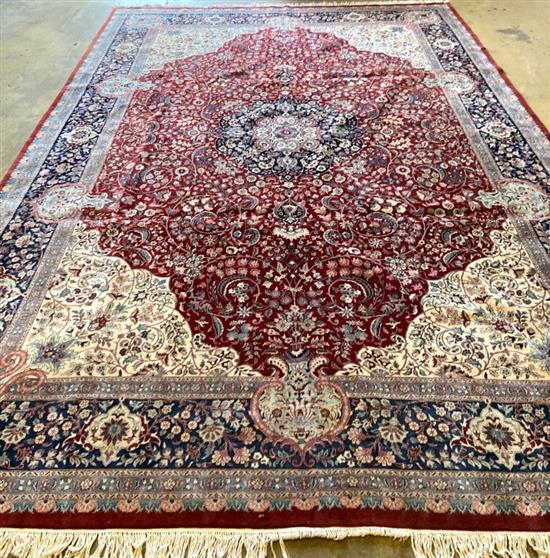A large Tabriz carpet, 550 x 367cm